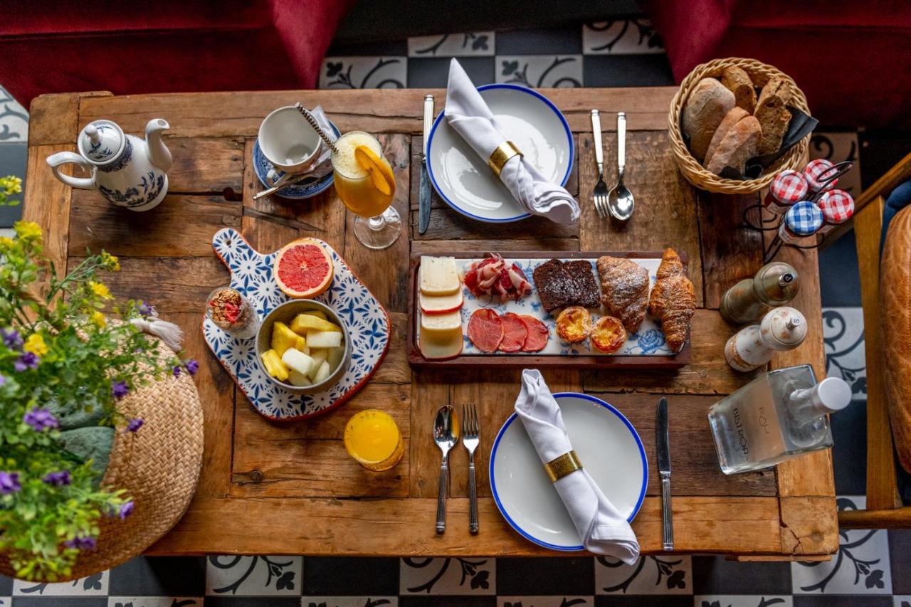 138 Liberdade Hotel ลิสบอน ภายนอก รูปภาพ A typical breakfast at the restaurant